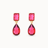 Close-up view of Ruby Dew Drops 18K gold-plated teardrop earrings, showcasing the intricate design and ruby-colored stones